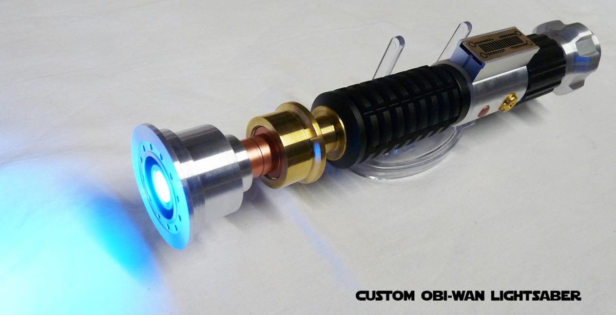 STAR WARS SABRE LASER OBI WAN KENOBI AVEC CRYSTAL (LAME AMOVIBLEPRACTICALFAIT MAIN)