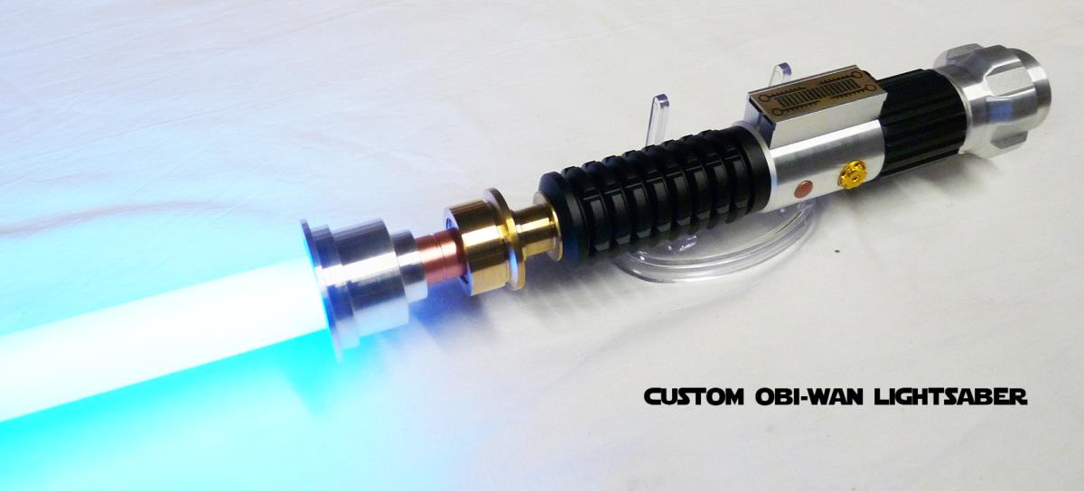 STAR WARS SABRE LASER OBI WAN KENOBI AVEC CRYSTAL (LAME AMOVIBLEPRACTICALFAIT MAIN)
